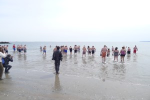 Entering the water - note the excited photographers stage left